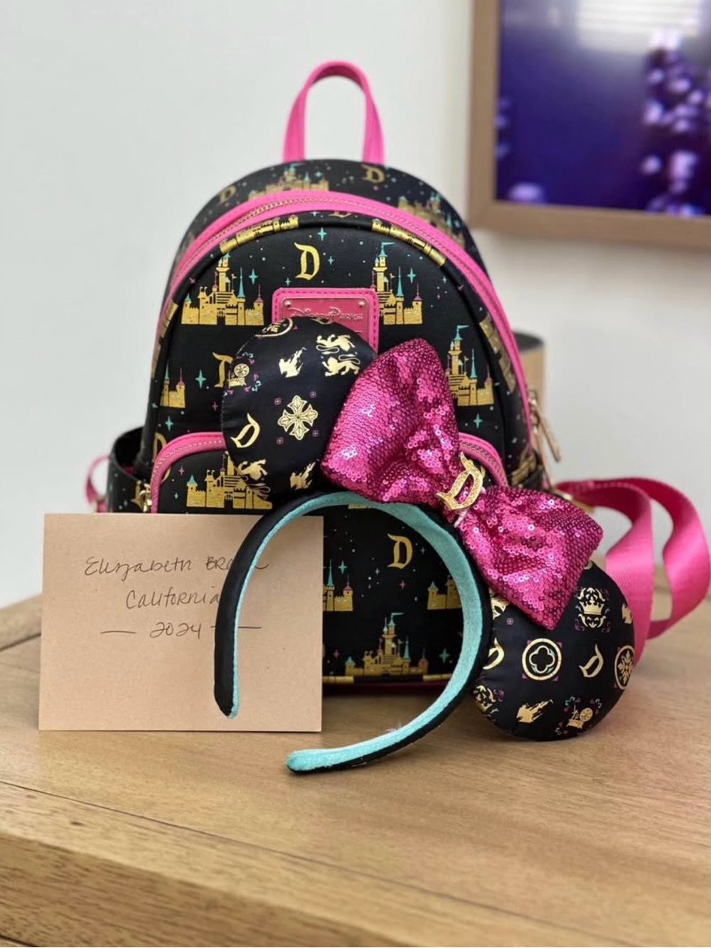 Loungefly Disneyland park exclusive Black & Pink Castle Print Mini Backpack